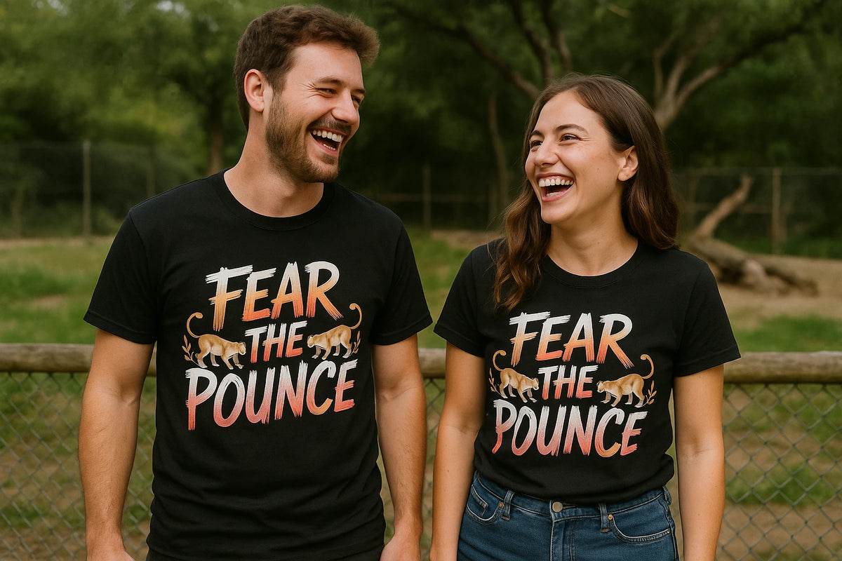 Person wearing the black cougar t shirt graphic tee - "Fear the Pounce" design