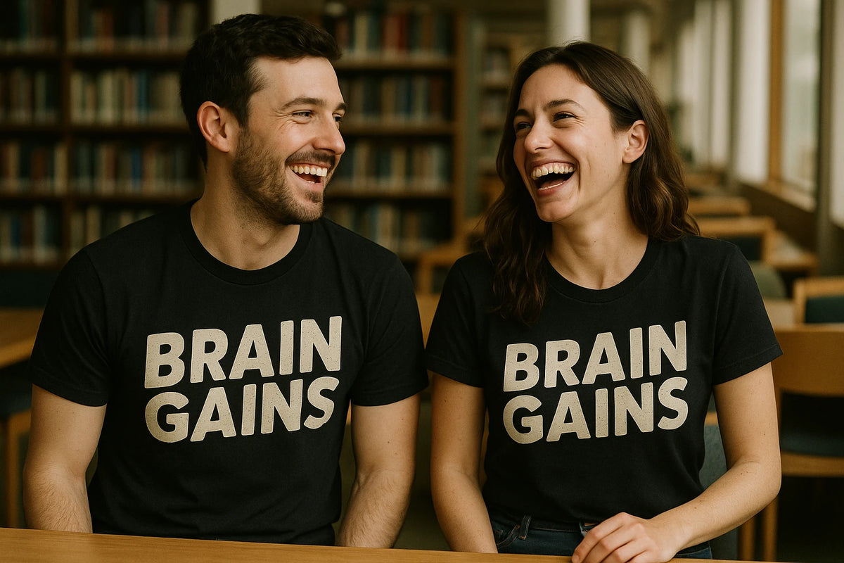 Person wearing the black studying t shirt graphic tee - "Brain Gains" design