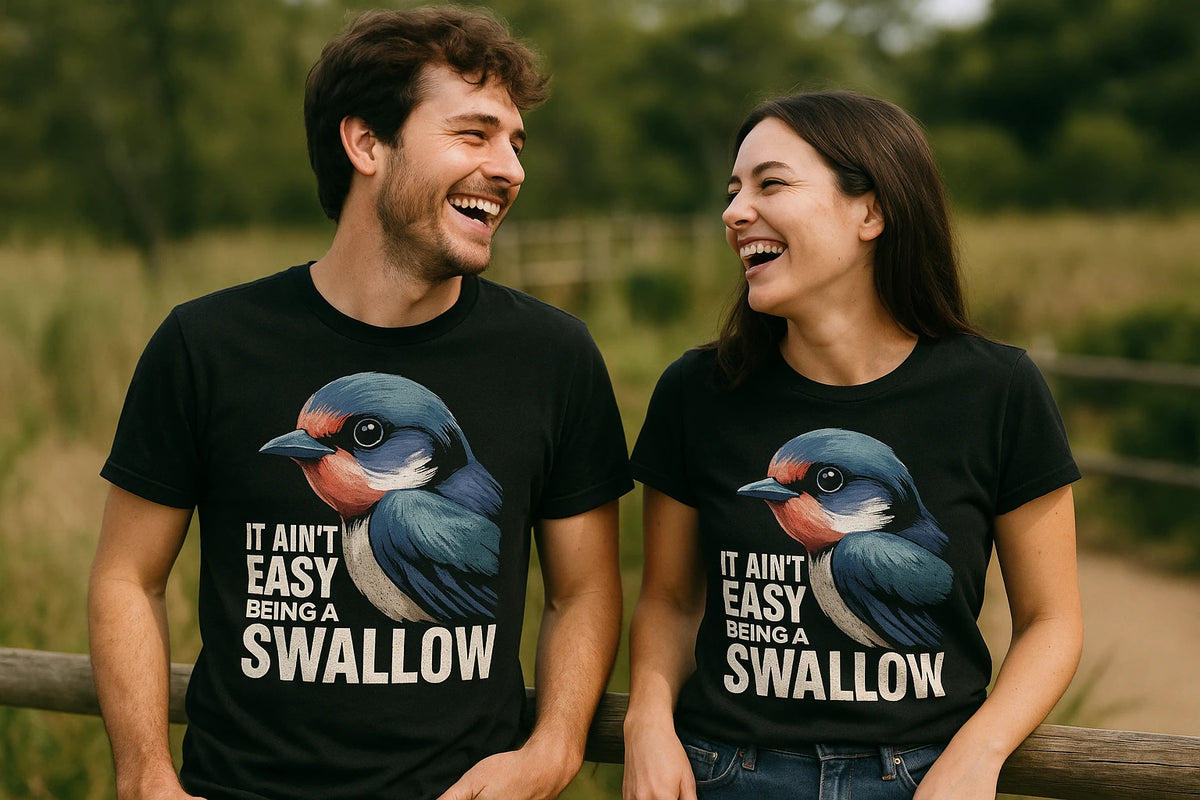 Person wearing the black t shirt i swallow graphic tee - "It Ain'T Easy Being a Swallow" design