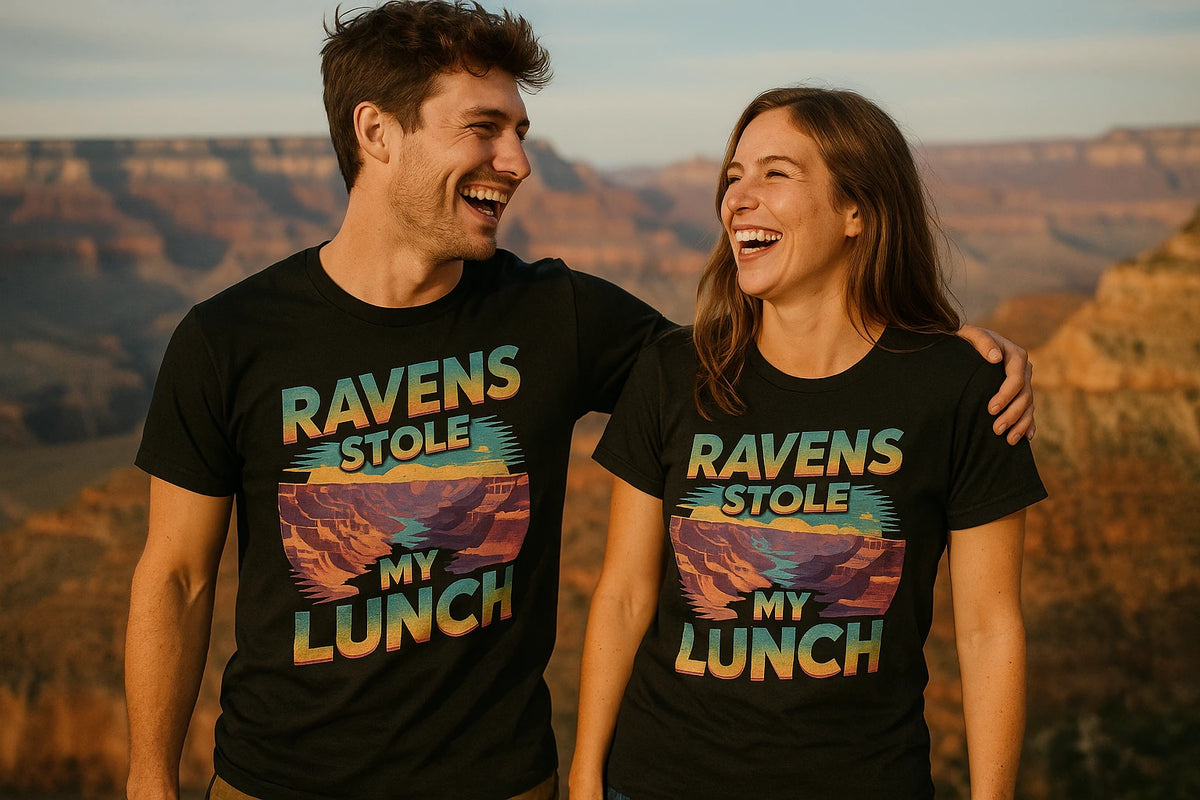 Person wearing the black i hiked the grand canyon t shirt graphic tee - "Ravens Stole My Lunch" design