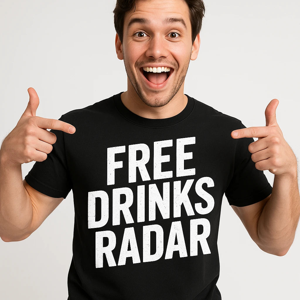 Close-up of the "Free Drinks Radar" white print on a premium Bella+Canvas black las vegas t shirt
