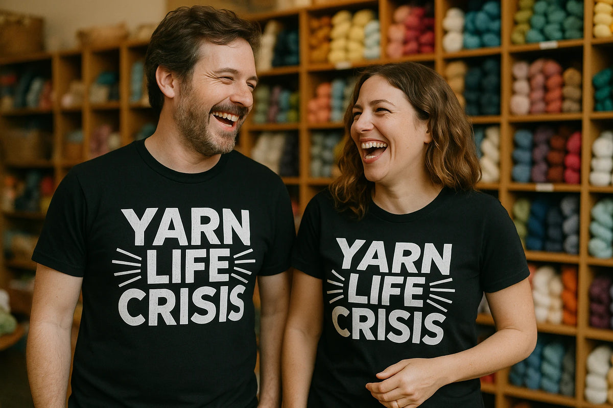 Person wearing the black knitting t shirt graphic tee - "Yarn Life Crisis" design