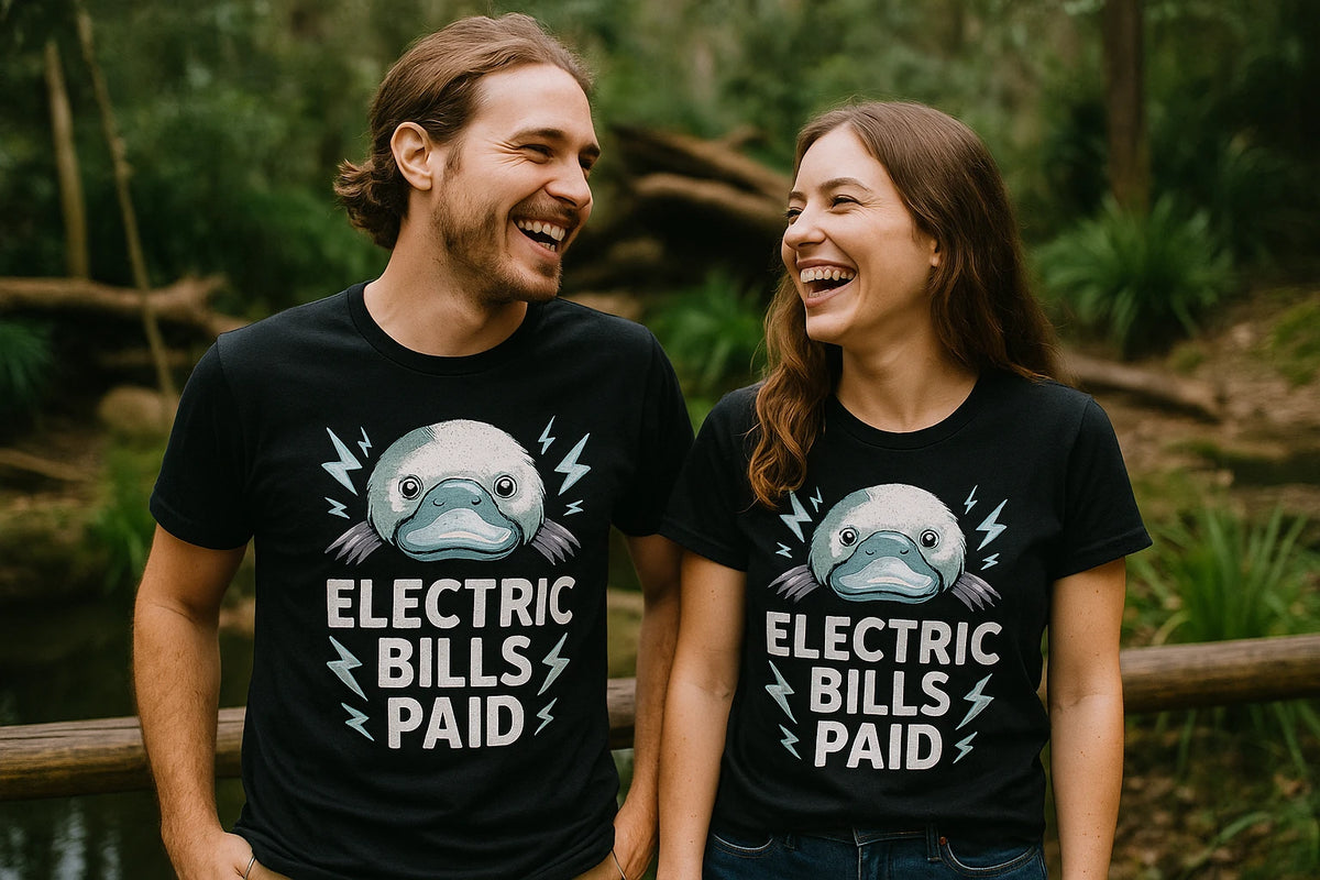 Person wearing the black platypus shirts graphic tee - "Electric Bills Paid" design