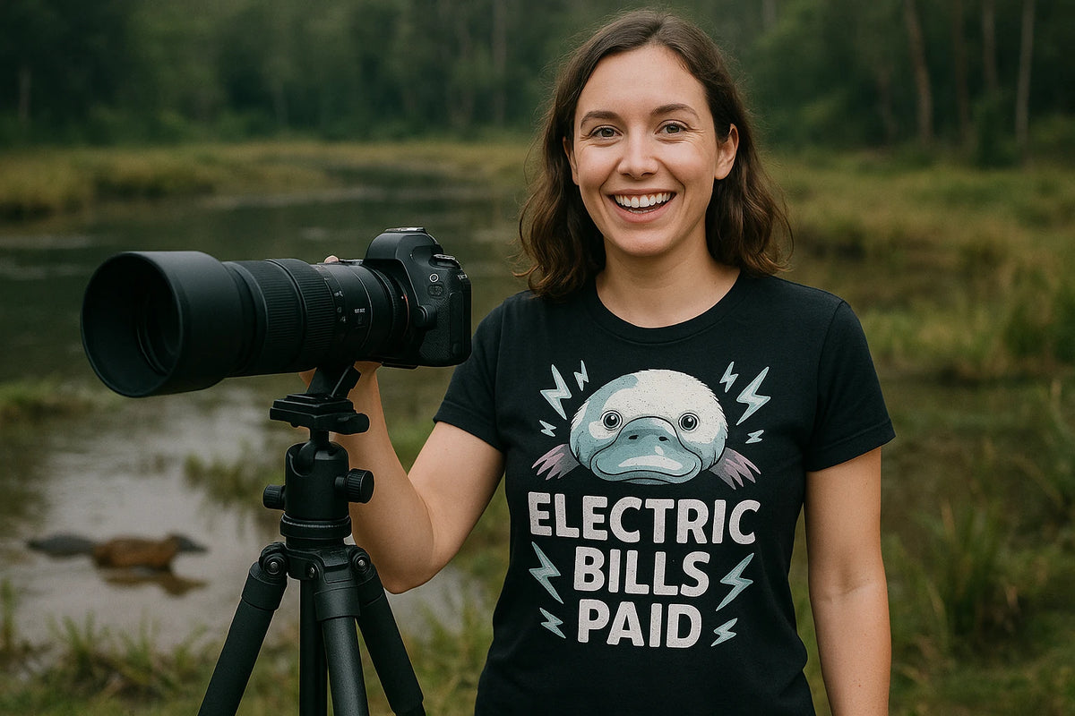 Lifestyle shot of the "Electric Bills Paid" black platypus shirts in a real-world setting