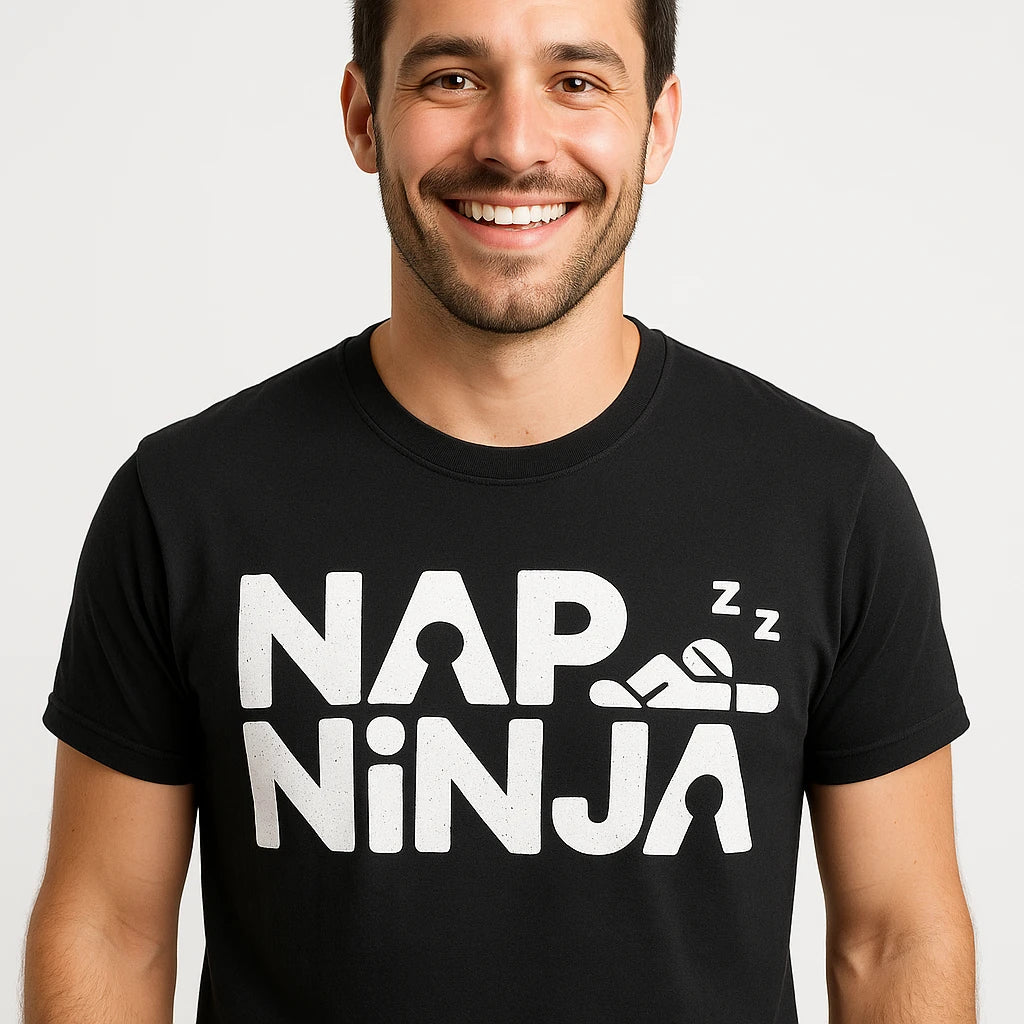 Close-up of the "Nap Ninja" white print on a premium Bella+Canvas black relaxing t shirt