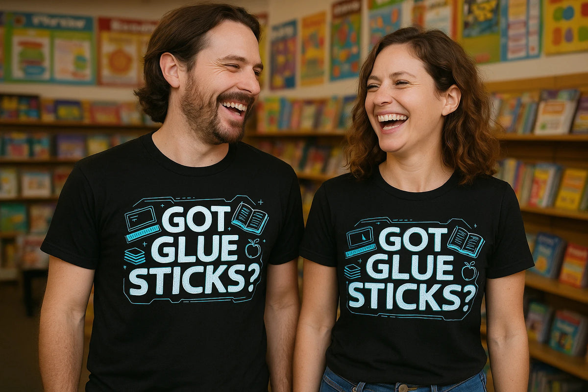 Person wearing the black teacher tee shirts graphic tee - "Got Glue Sticks?" design