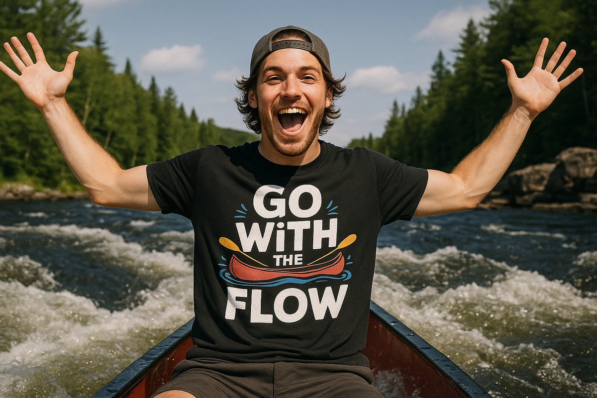 Lifestyle shot of the "Go With the Flow" black beaver canoe t shirt in a real-world setting