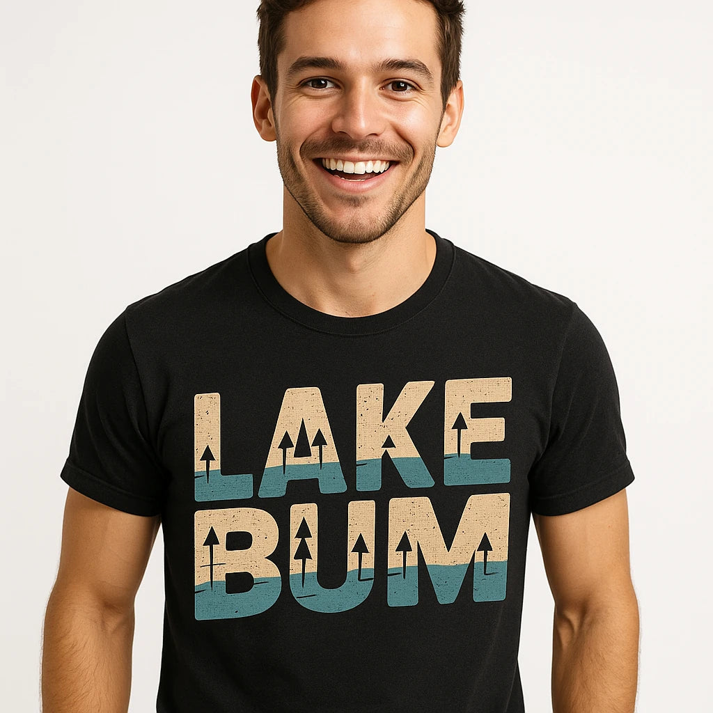Close-up of the "Lake Bum" tan print on a premium Bella+Canvas black lake t shirt