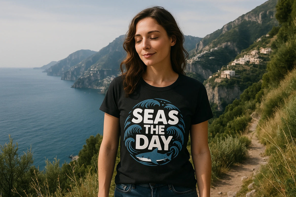Lifestyle shot of the "Seas the Day" black oceans t shirt in a real-world setting