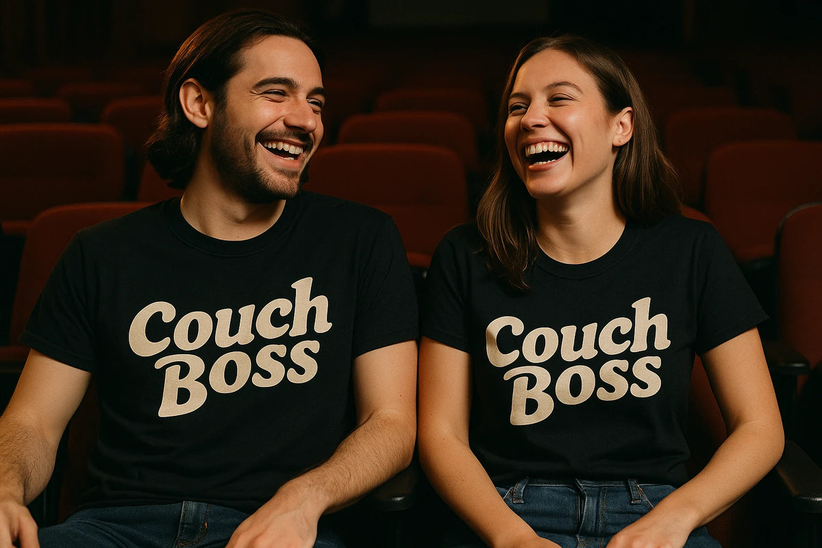 Person wearing the black graphic tee graphic tee - "Couch Boss" design