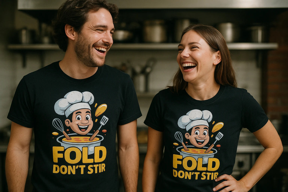 Person wearing the black cooking t shirt graphic tee - "Fold Don'T Stir" design