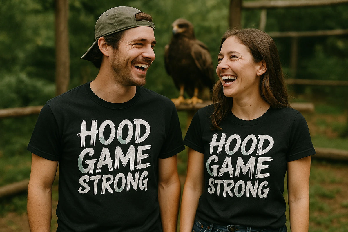 Person wearing the black falcon t shirt graphic tee - "Hood Game Strong" design