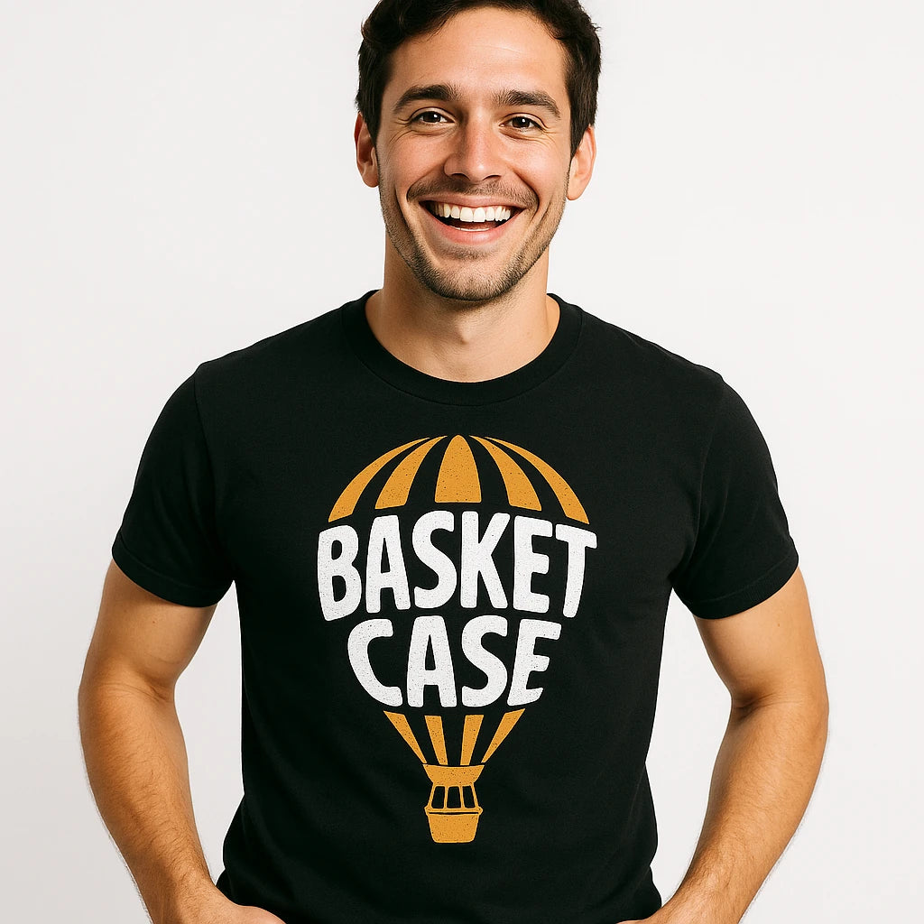 Close-up of the "Basket Case" white print on a premium Bella+Canvas black hot air balloon t shirt
