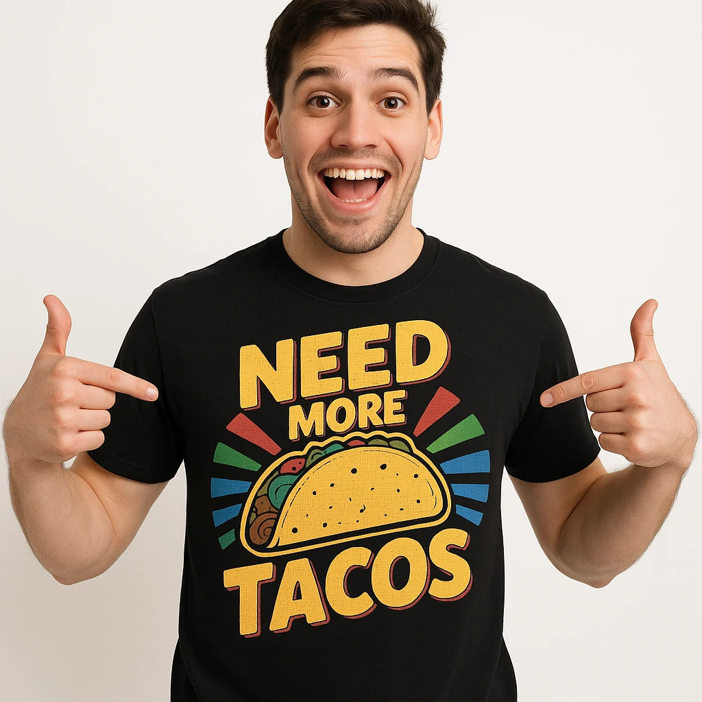 Close-up of the "Need More Tacos" gold print on a premium Bella+Canvas black taco shirts