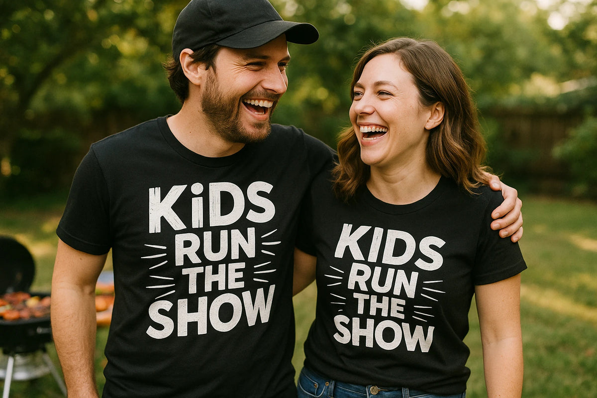 Person wearing the black family life t shirt graphic tee - "Kids Run the Show" design