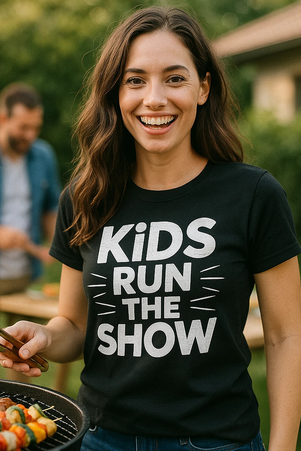 "Kids Run the Show" black family life t shirt, photographed as family life lover gift