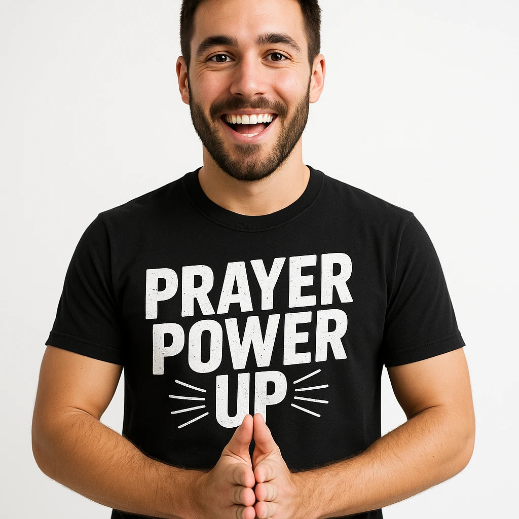Close-up of the "Prayer Power Up" white print on a premium Bella+Canvas black faith shirts