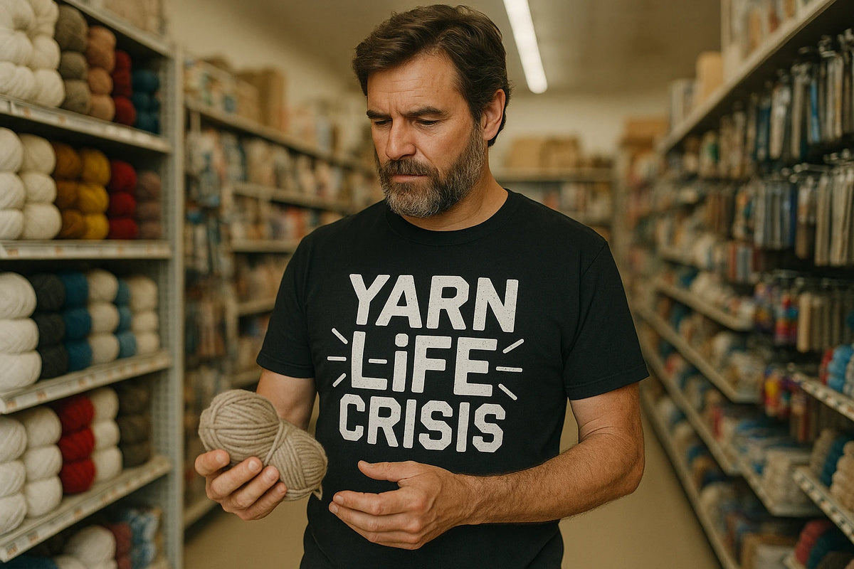 Lifestyle shot of the "Yarn Life Crisis" black knitting shirts in a real-world setting