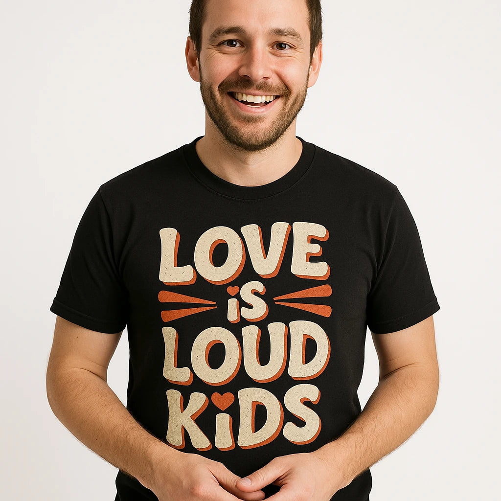 Close-up of the "Love Is Loud Kids" beige print on a premium Bella+Canvas black family life t shirt