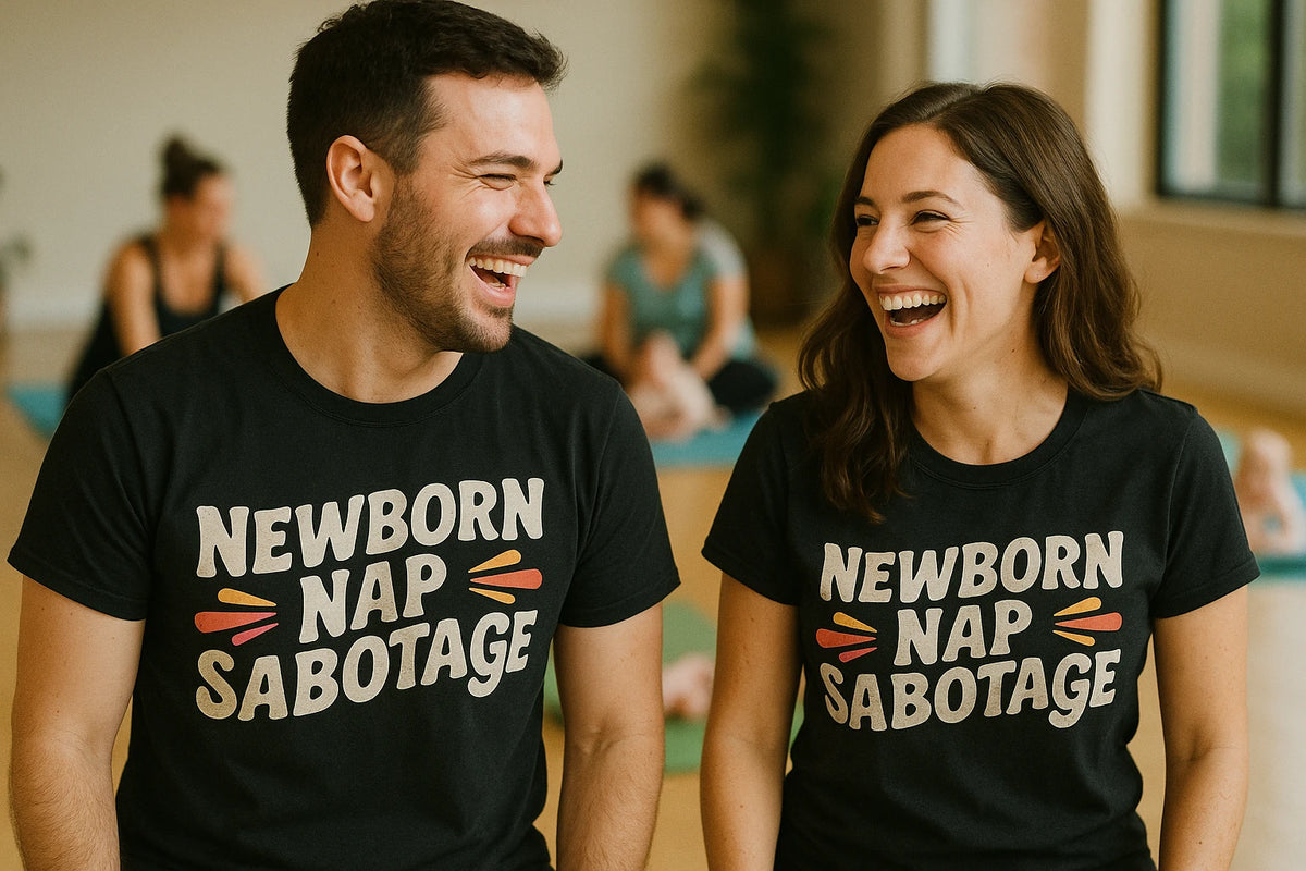 Person wearing the black shirts for expecting parents graphic tee - "Newborn Nap Sabotage" design