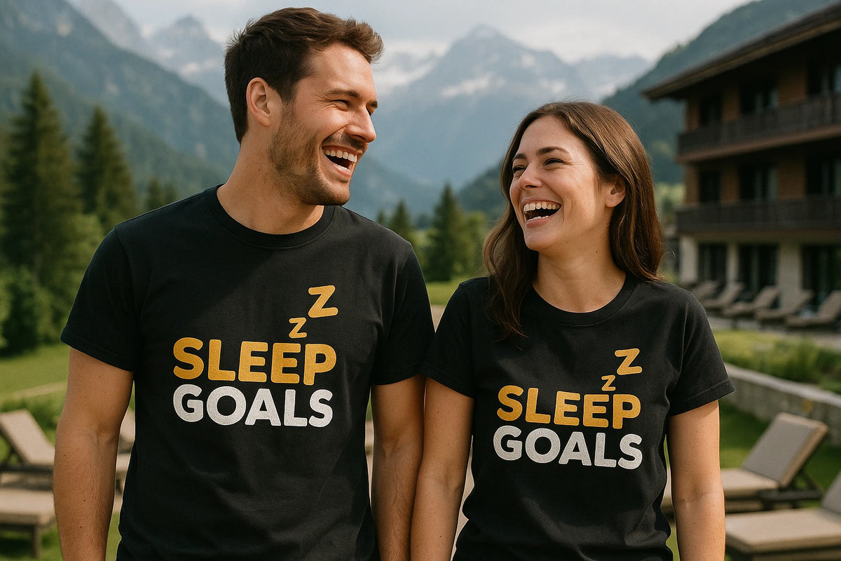Person wearing the black cotton sleep shirts graphic tee - "Sleep Goals" design