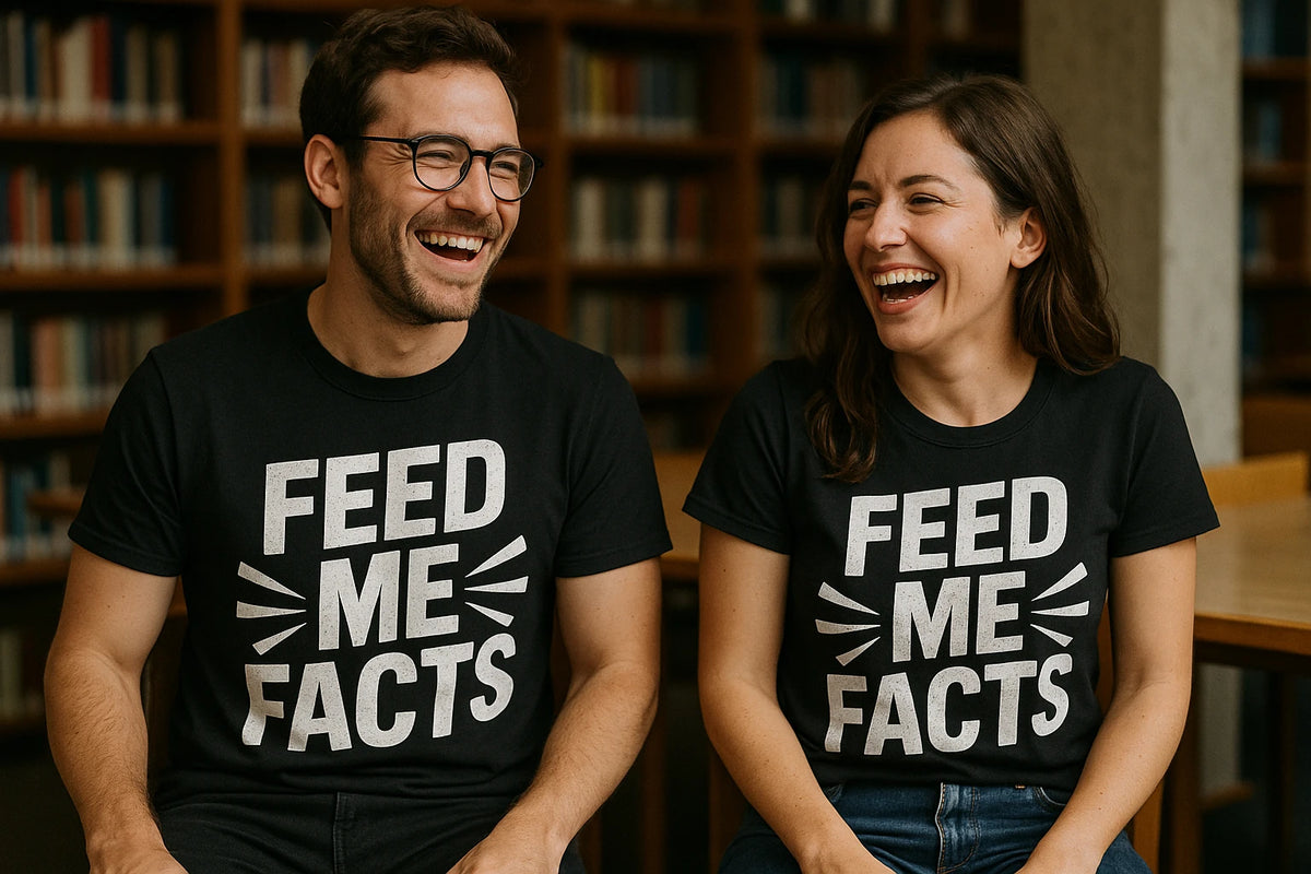 Person wearing the black studying t shirt graphic tee - "Feed Me Facts" design