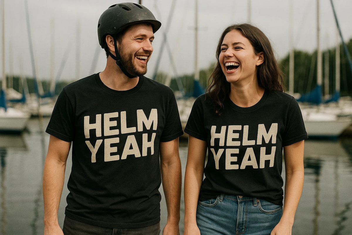 Person wearing the black sailboat t shirt graphic tee - "Helm Yeah" design