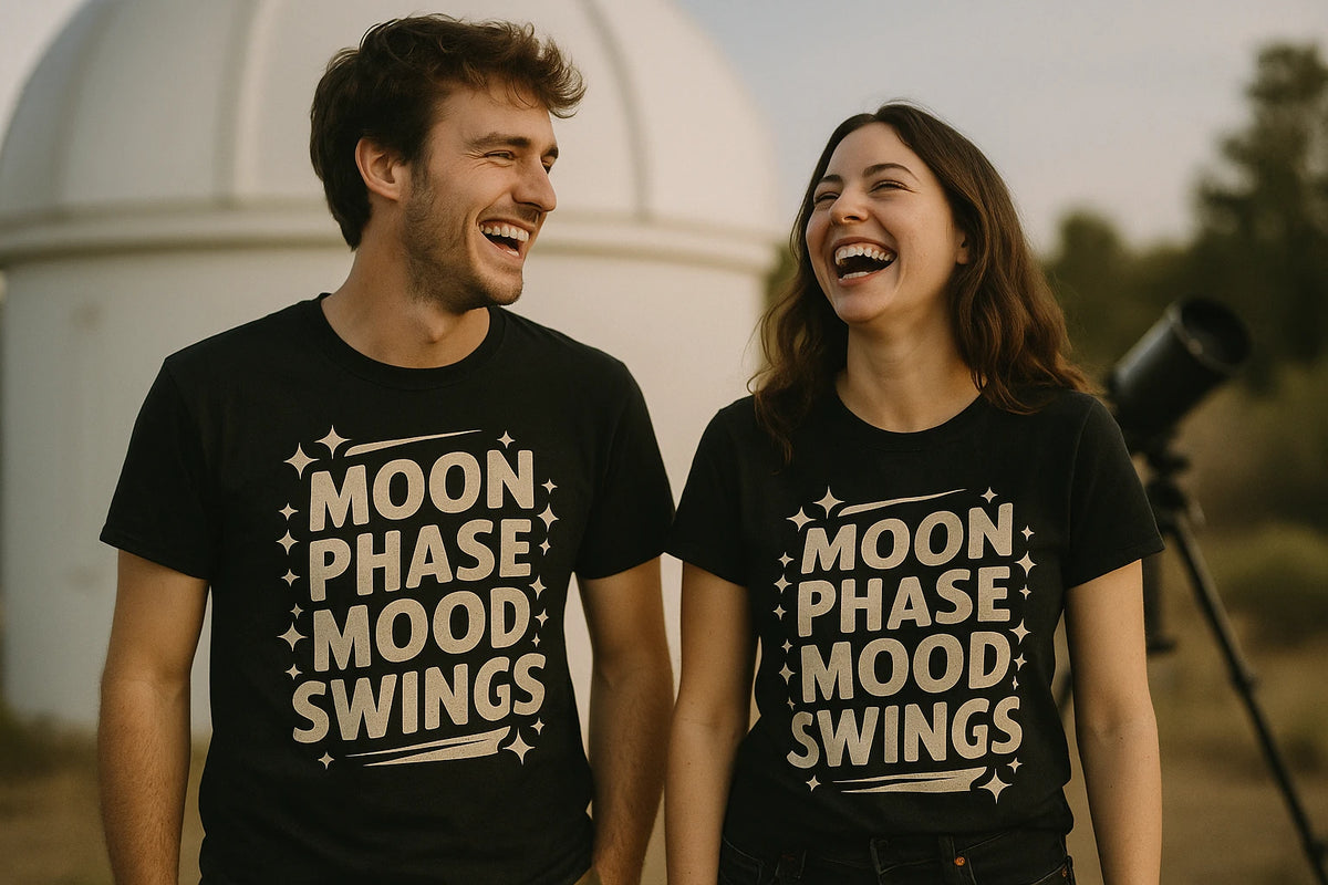 Person wearing the black stargazing t shirt graphic tee - "Moon Phase Mood Swings" design