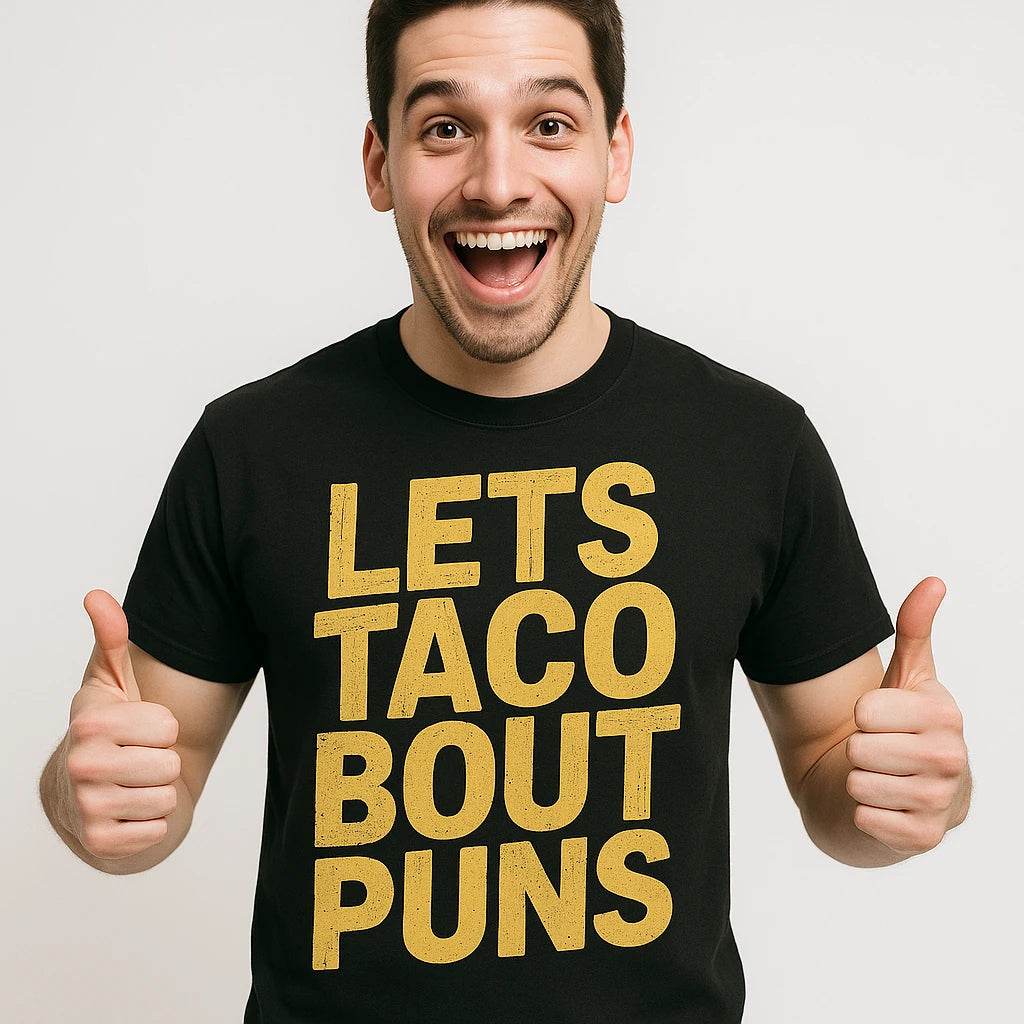 Close-up of the "Lets Taco Bout Puns" gold print on a premium Bella+Canvas black comedy tshirts