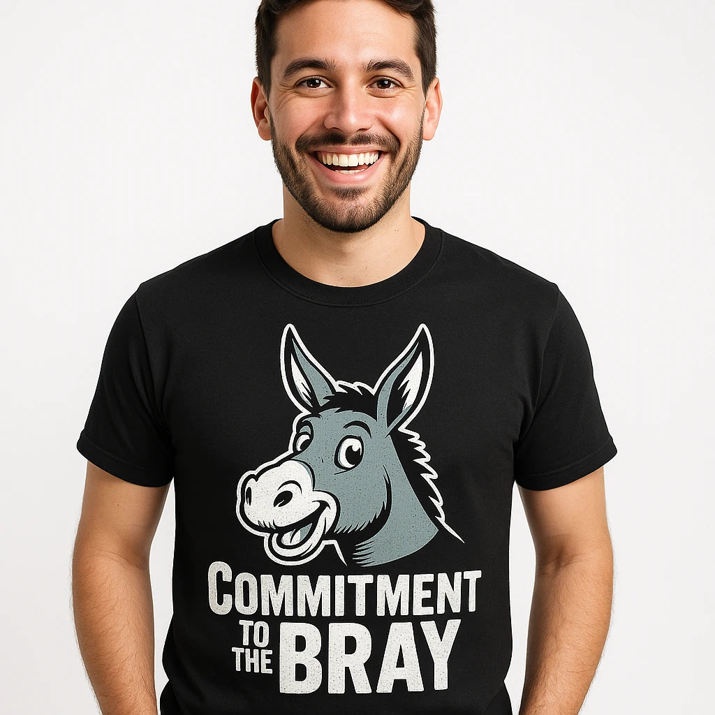 Close-up of the "Commitment To the Bray" white print on a premium Bella+Canvas black donkey tee shirts