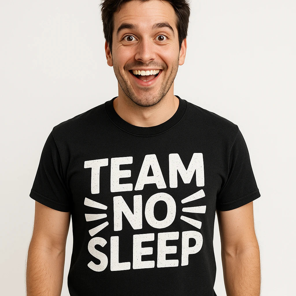 Close-up of the "Team No Sleep" white print on a premium Bella+Canvas black sleep deprived t shirt