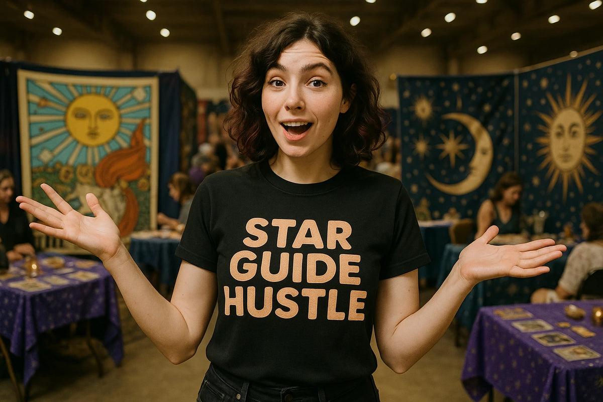 Lifestyle shot of the "Star Guide Hustle" black astrology shirts in a real-world setting
