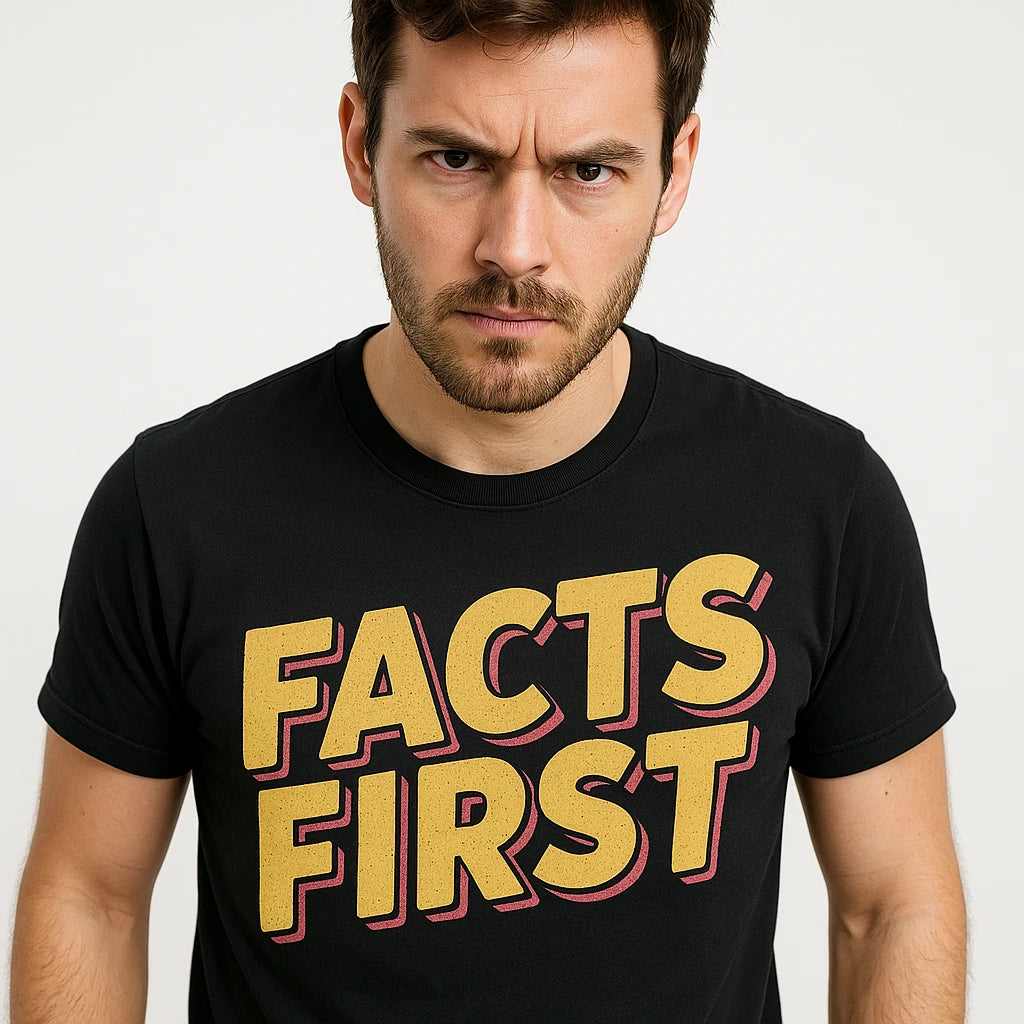 Close-up of the "Facts First" gold print on a premium Bella+Canvas black journalist t shirt