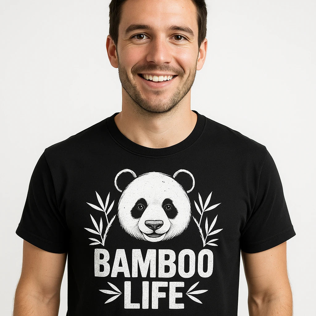 Close-up of the "Bamboo Life" white print on a premium Bella+Canvas black panda tee shirt