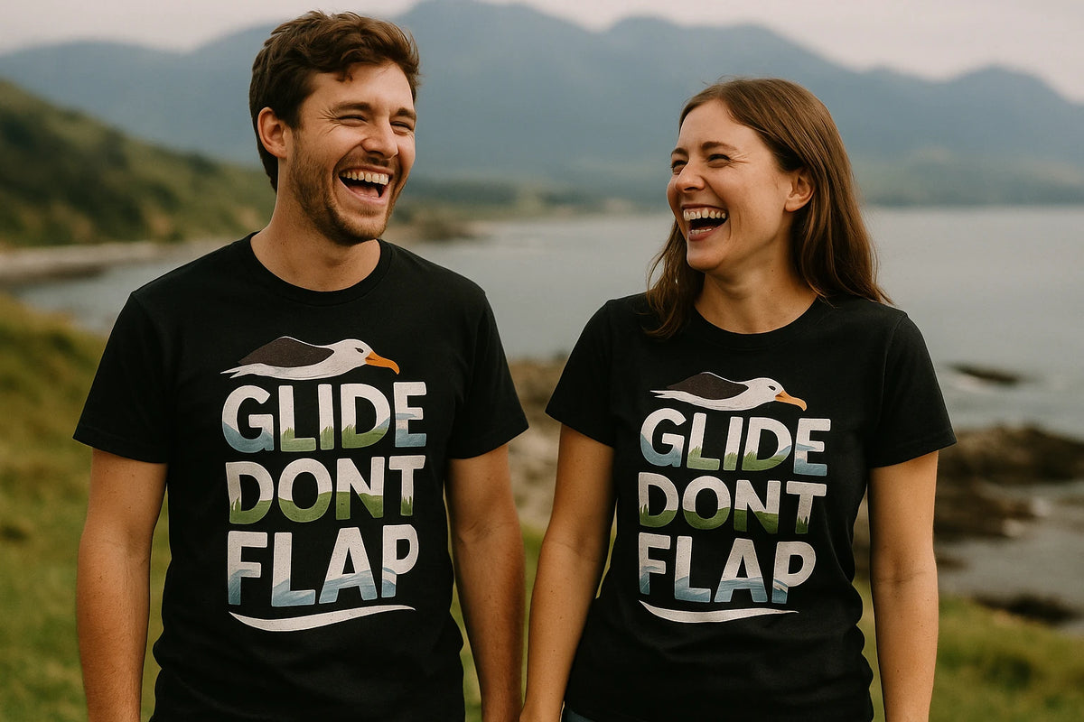 Person wearing the black albatross t shirt graphic tee - "Glide Dont Flap" design