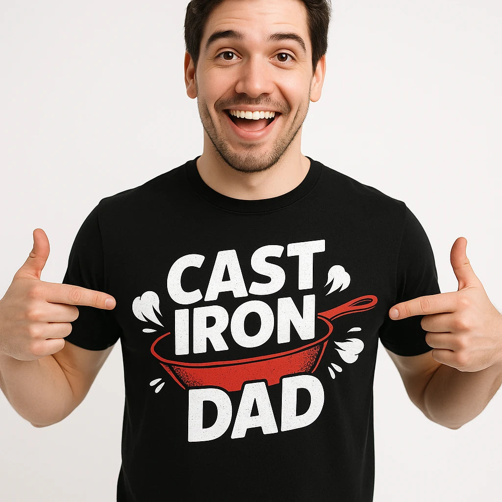 Close-up of the "Cast Iron Dad" white print on a premium Bella+Canvas black cooking t shirts funny
