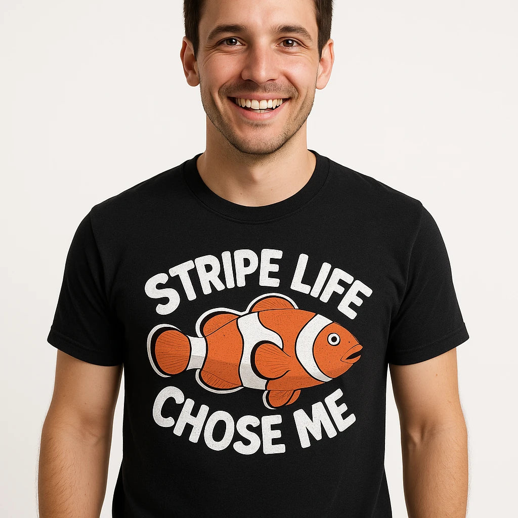 Close-up of the "Stripe Life Chose Me" white print on a premium Bella+Canvas black clownfish t shirt