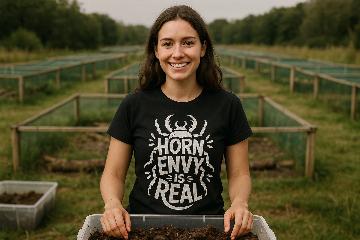 Lifestyle shot of the "Horn Envy Is Real" black beetle shirts in a real-world setting