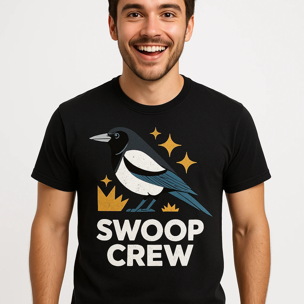 Close-up of the "Swoop Crew" white print on a premium Bella+Canvas black magpie t shirt