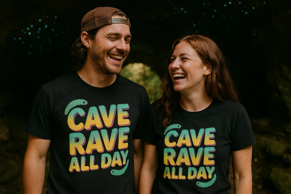 Person wearing the black glowworms t shirt graphic tee - "Cave Rave All Day" design