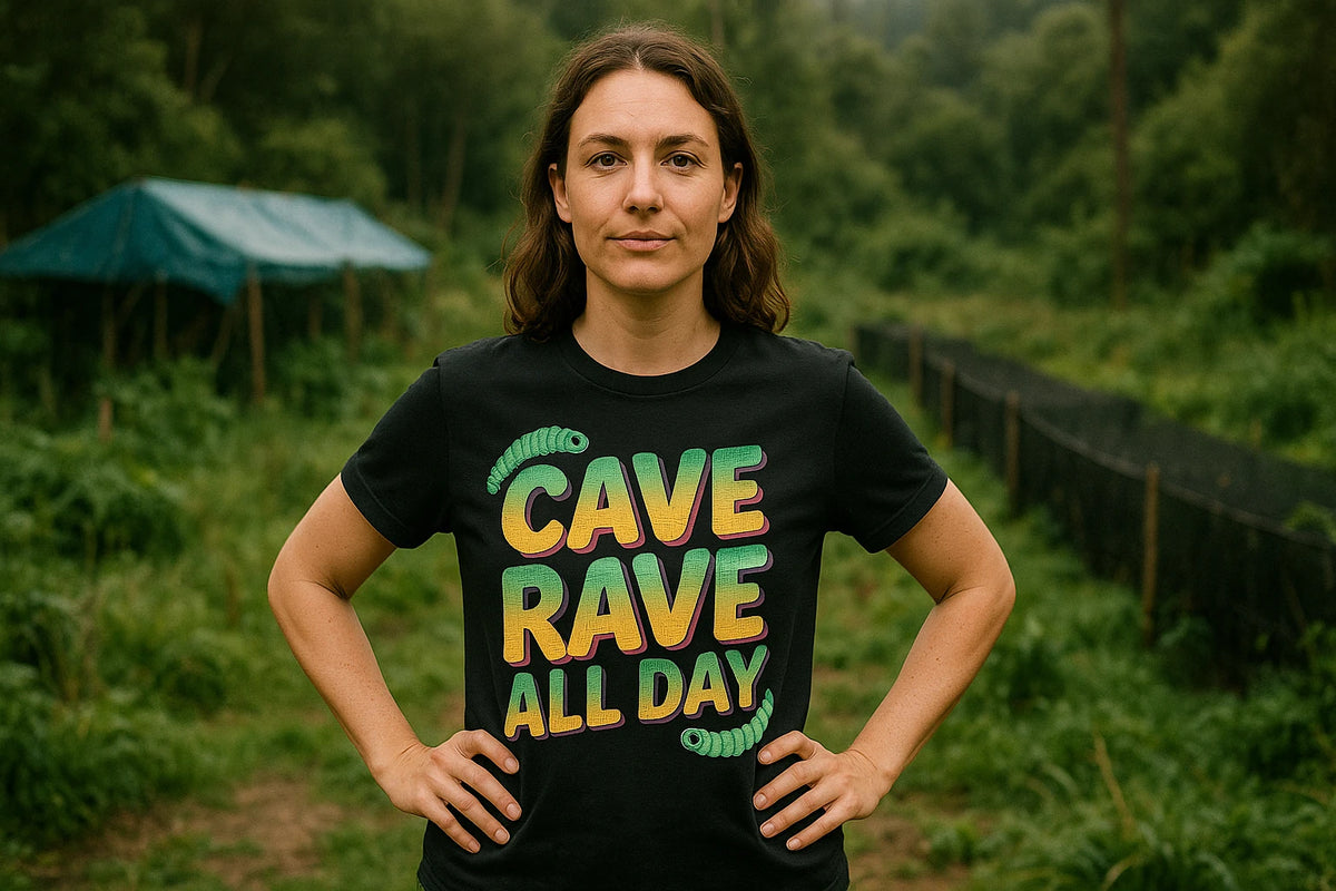 Lifestyle shot of the "Cave Rave All Day" black glowworms t shirt in a real-world setting