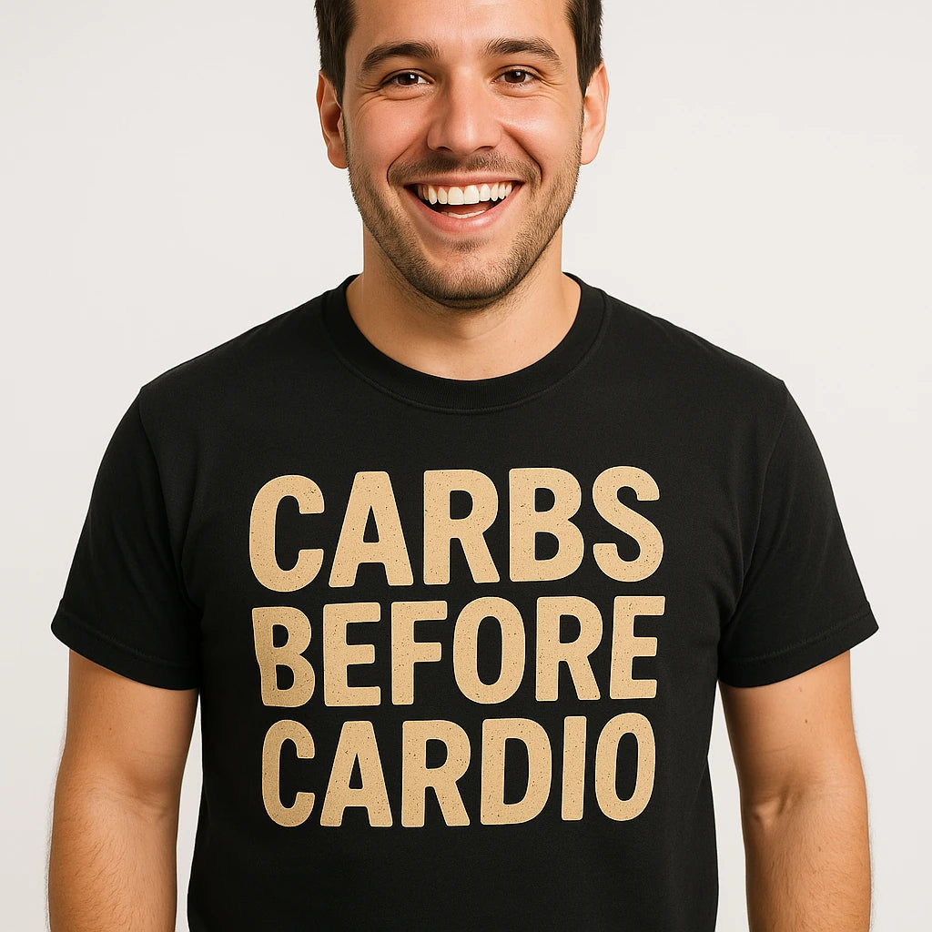 Close-up of the "Carbs Before Cardio" tan print on a premium Bella+Canvas black pasta t shirt