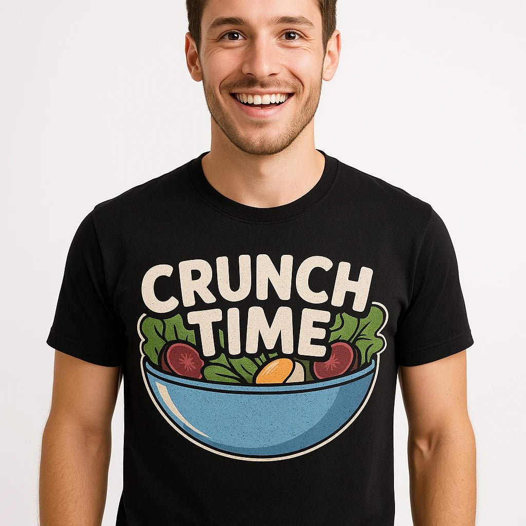 Close-up of the "Crunch Time" gray print on a premium Bella+Canvas black salad t shirt