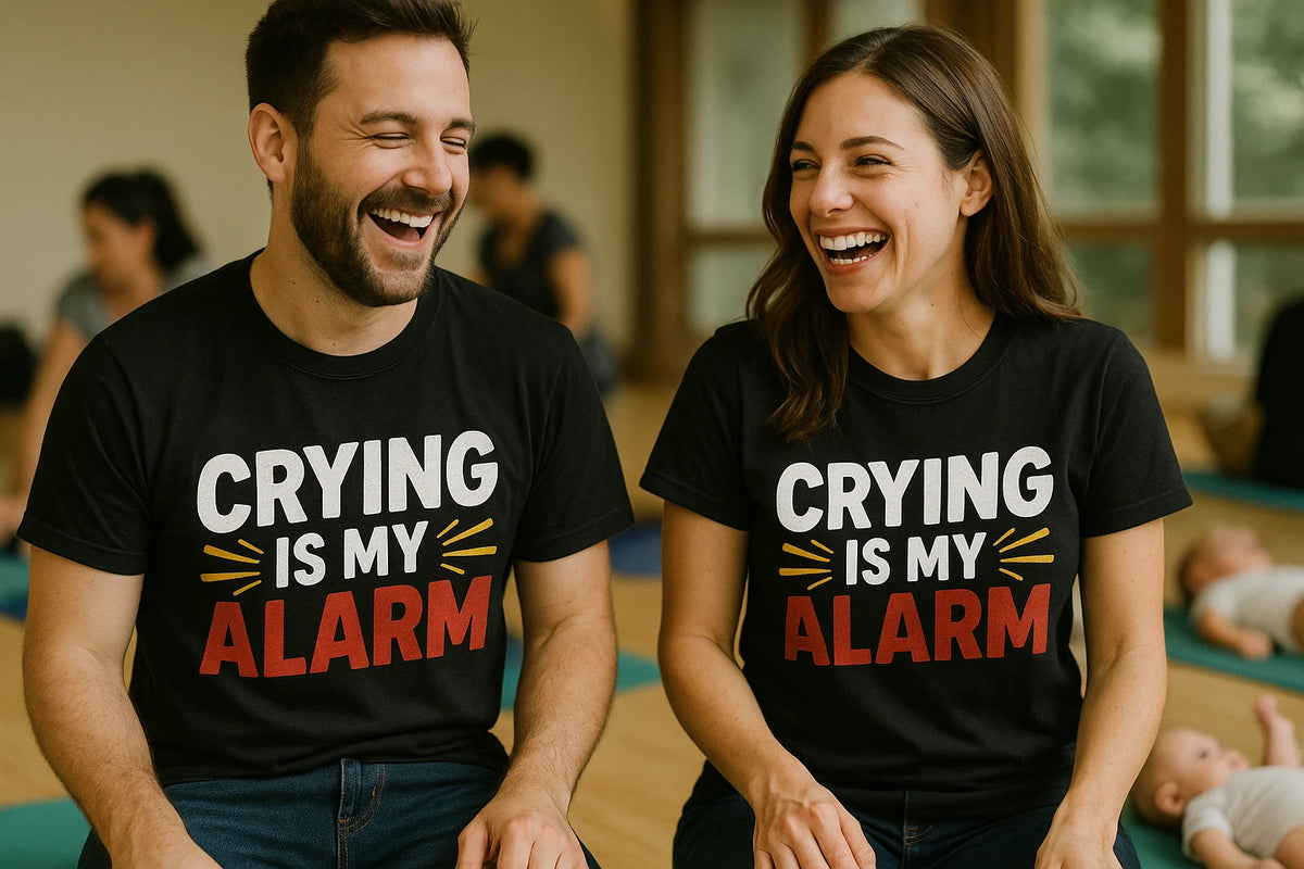 Person wearing the black first time parents t shirts graphic tee - "Crying Is My Alarm" design