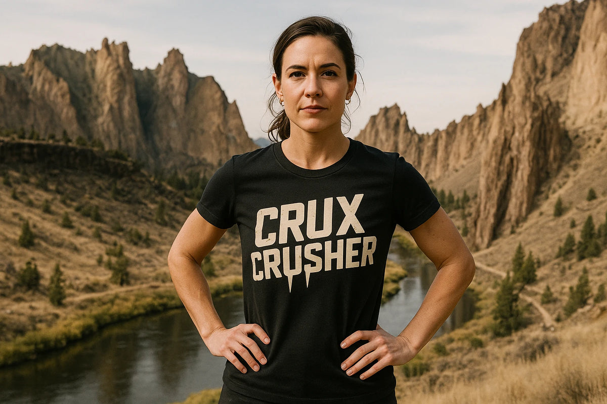 Lifestyle shot of the "Crux Crusher" black rock climbing tee shirts in a real-world setting