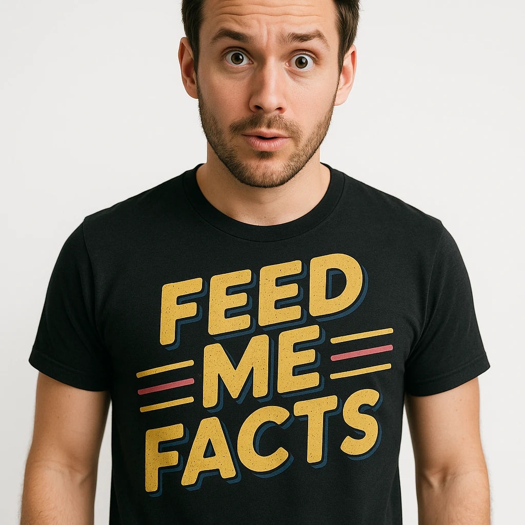 Close-up of the "Feed Me Facts" gold print on a premium Bella+Canvas black studying t shirt