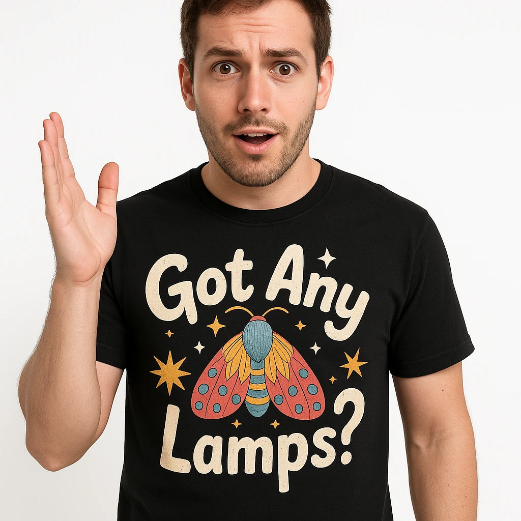 Close-up of the "Got Any Lamps" cream print on a premium Bella+Canvas black moth t shirt