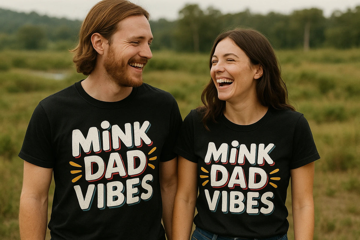Person wearing the black mink t shirt graphic tee - "Mink Dad Vibes" design
