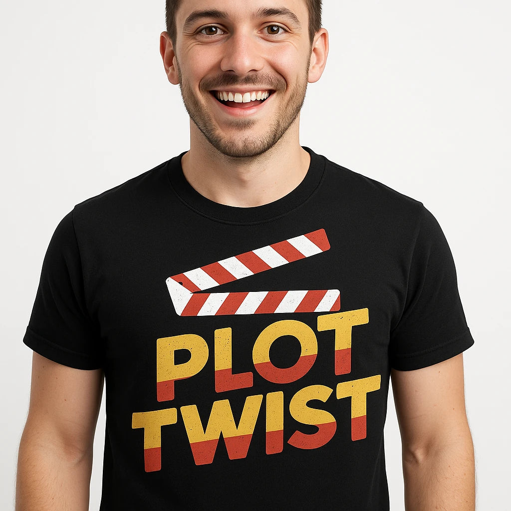 Close-up of the "Plot Twist" orange print on a premium Bella+Canvas black graphic tee