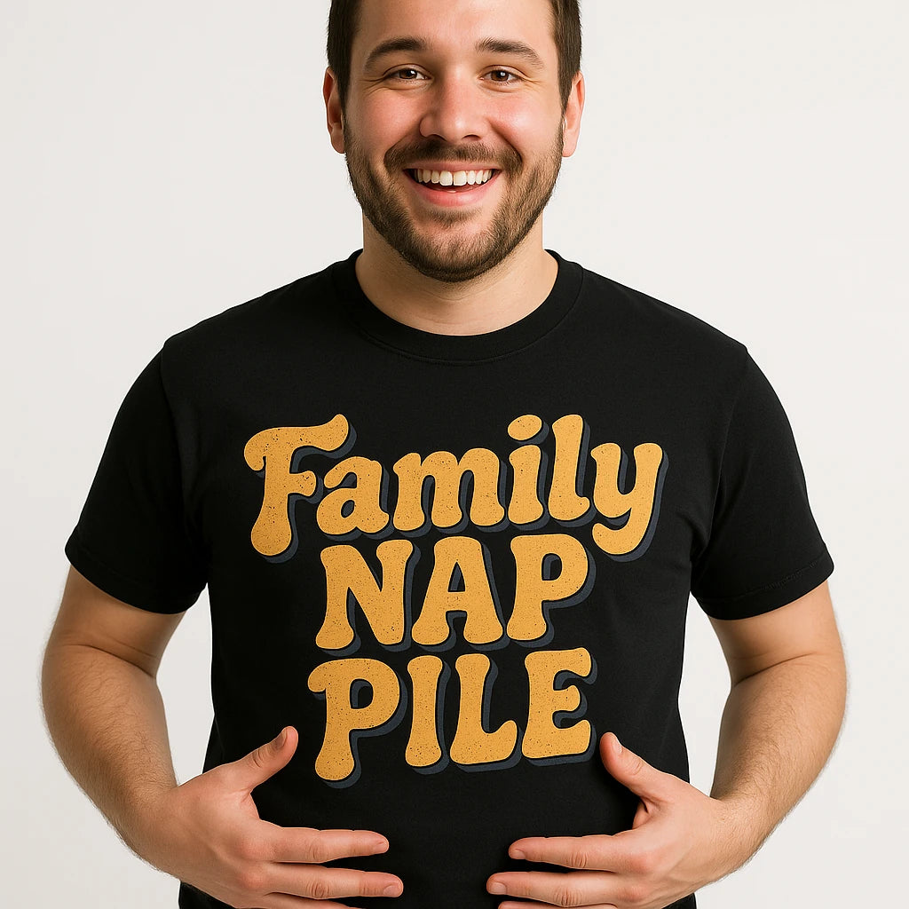 Close-up of the "Family Nap Pile" gold print on a premium Bella+Canvas black family life t shirt